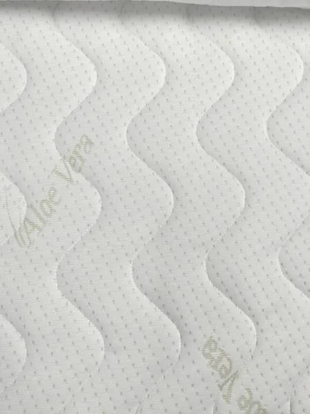 Aloe Vera Skin Care tepitud kattekanga lähivaade